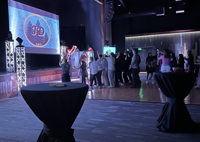 Photo of a group of people standing on a dance floor